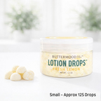 Buttermood Soap Studio Lotion Drops in a jar with lemon scent on a light background